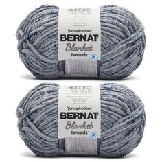 two skeins of yarn with the words bernat tweed on top and bottom