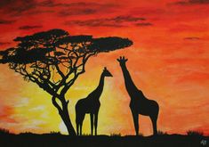 two giraffes are silhouetted against an orange sunset