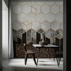 a dining room with an abstract wallpaper and wooden chairs in front of the table