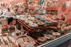 there are many different types of donuts on display