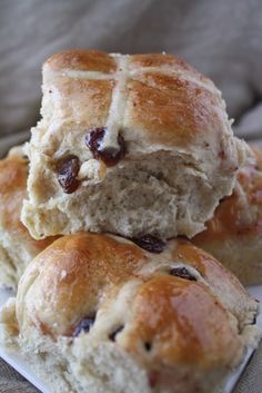 three hot cross buns stacked on top of each other