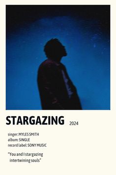 a man standing in front of a blue background with the words stargazing on it