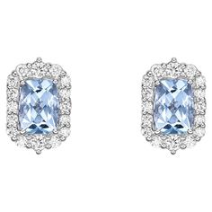 This collection features an array of aquamarines with an icy blue hue that is as cool as it gets! Accented with diamonds these Stud Earrings are made in white gold and present a classic yet elegant look. Aquamarine stud Earrings in 18Karat White Gold with White Diamond. Aquamarine: 1.616 carat, 7X5mm size, cushion shape. White Diamond: 0.163 carat, 2.20mm size, round shape, G color, VS clarity. White Diamond: 0.125 carat, 1.6mm size, round shape, G color, VS clarity White Diamond: 0.225 carat, 1 Luxury Platinum Blue Earrings, Luxury Blue Platinum Earrings, Blue Platinum Earrings For Wedding, Silver Blue Topaz Earrings With Brilliant Cut, Silver Earrings With Brilliant Cut Blue Topaz, Luxury Aquamarine Blue Earrings, Luxury Blue Aquamarine Earrings, Blue Halo Diamond Earrings Luxury Style, Aquamarine Studs