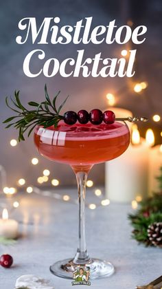 the mistletoe cocktail is garnished with cranberries and rosemary