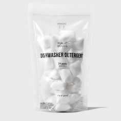 a bag of white marshmallows sitting on top of a table