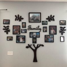 a family tree with many pictures on it and the word family written in large letters