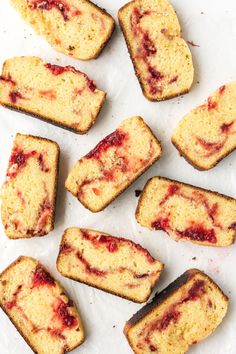 several slices of strawberry bread on a white surface