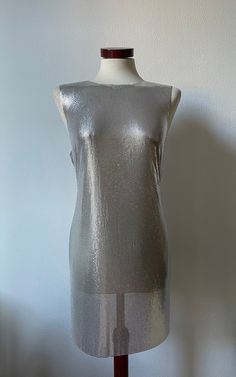 EXPRESS SHIPPING OPTION AVAILABLE AT CHECKOUT WHEN YOU ADD AN ITEM TO YOUR CART! -------------------- Description The Phoebe Chainmail Dress in Silver comes in 2 versions: with lining inside or no lining. Chose the one you prefer!  -------------------- - Handmade in Barcelona, Spain - Everything's created and designed by me, so if you want another color, a Made to Measure item or to change something feel free to message me! -------------------- Composition Material: crystal mesh. Inside: lycra M Summer Chainmail Dress, Glamorous Evening Dresses With Chainmail, Summer Party Chainmail Dress, Disco Style Sleeveless Mini Dress For Evening, Sleeveless Disco Mini Dress For Evening, Sleeveless Chainmail Dresses For Night Out, Glamorous Chainmail Dresses For Night Out, Sleeveless Chainmail Party Dress, Sleeveless Chainmail Dress For Party