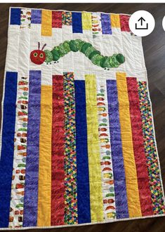 the very hungry caterpillar quilt is on display