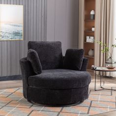 a living room with a round chair in it