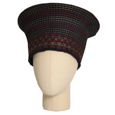 This elegant Zulu Basket Hat with a multi-colored pattern is the perfect accessory to upgrade any outfit. This piece is handmade by Zulu artisans in South Africa. The hat is made out of woven grass, polyester cloth patterned with cotton and wool threads. It can be worn on special occasions like birthdays, weddings, and formal gatherings. As with all handmade items, no two pieces are the same. Assorted colors: Black with Yellow and White, Orange, Black with Gold, Black with Red, Black with Yellow Basket Hat, Wool Thread, Zulu, Red And Gold, Hat Pattern, Gold Black, Clothing Patterns, Two Pieces, Orange Black