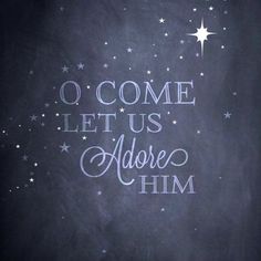 a chalkboard with the words o come let us adore him