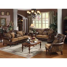 a living room filled with furniture and a chandelier