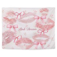 a pink wall hanging with lipstick on it and the words pink dream written in red