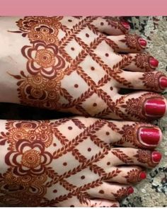 feet with henna tattoos on them