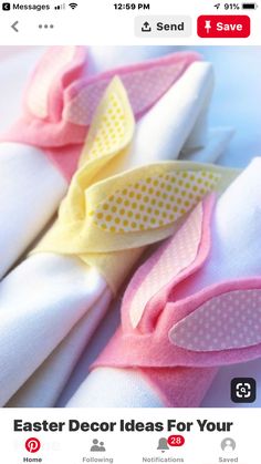 three napkins with pink, yellow and white bows on them are sitting next to each other