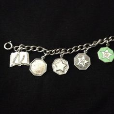 Vintage-Sterling-Girls-Auxiliary-Charm-Bracelet-w-9-Charms -  Mine is the fourth charm over (white star with GA). Bracelets Charms, Vintage Charm Bracelet, Antique Bracelets, University Of Kentucky, White Star, Bracelets And Charms, Vintage Charms, Vintage Antiques, Jewelry Watches