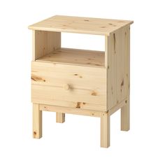 a small wooden nightstand with drawers on one side and an open drawer on the other