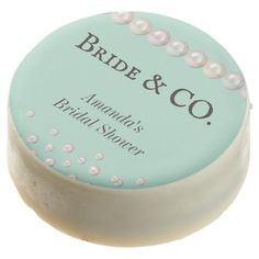 a close up of a soap with pearls on it and the words bride & co