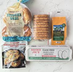 bread, cheese and other items are laid out on the counter