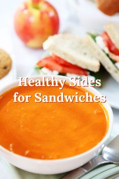 healthy sides for sandwiches in a white bowl on a table with silverware and fruit