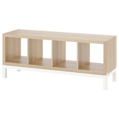 a wooden shelf with three compartments on each side