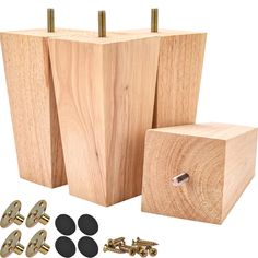 three wooden blocks with screws and studs on them