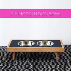 two metal bowls sitting on top of a wooden tray with the words diy modern dog bowl