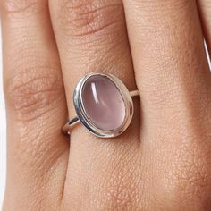 "Rose Quartz Ring, 925 Solid Sterling Silver Ring, January Birthstone Ring, Oval Gemstone Ring, Healing Crystal Ring, Handmade Jewelry Ring Gemstone Name - Rose Quartz Stone Quality - AAA Weight - 3.66 gm Ring Length- 1.5 cm Ring Width- 1.2 cm Stone Shape - As shown in the picture Ring Size- All Ring Size Available We serve complete 925 sterling silver Jewelry and genuine properties of the stone. The products are dispatched from the small business from UK Product Quality and Packaging - Our all Oval Natural Stone Rings For Anniversary, Oval Rings With Natural Stones For Anniversary, Oval Natural Stones Anniversary Rings, Oval Crystal Ring With Natural Stones For Anniversary, Oval Natural Stone Promise Ring, Oval Natural Stones Promise Ring, Chic Oval Natural Stone Promise Ring, Pink Oval Moonstone Ring, Oval Crystal Ring With Natural Stones For Promise