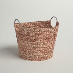 an empty basket with handles on a white background