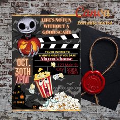 an image of a halloween movie party with popcorn and jack - o'- lantern