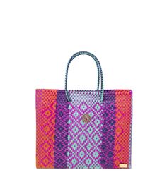 Embrace the artistry and sustainable craftsmanship of Mexico's native artists with Lola's Bag. Handmade by skilled artisans from the Southeast of Mexico, these exquisite bags are more than just accessories; they are a testament to culture, creativity, and eco-conscious living. Lola's Bag is a symbol of sustainability. Each bag is meticulously handwoven from recycled plastic, reducing environmental impact and contributing to a greener world. Elevate your style with the distinctive touch of a sterling silver or gold-plated signature flower and Lola's Bag logo plate. These exquisite embellishments add an element of sophistication and uniqueness to every bag. Designed for everyday practicality, these bags are waterproof, ensuring your belongings stay safe and dry even in unpredictable weather. Colorful Tote Bags, Bag Logo, April Birthstone Jewelry, Alphabet Jewelry, Bootie Sandals, Forever Jewelry, Bags Logo, Pearl Jewellery Earrings, Bag Handmade