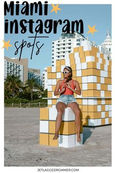 a woman sitting on top of a giant yellow and white block with the words miami instagram spots