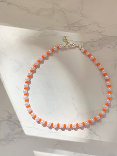 Fall glass orange bead pearl choker or necklace. Adjustable length. Perfect gift for birthday or for yourself! Fall necklace. Custom sizing and designs available! Fall Beaded Chokers, Fall Necklaces Diy, Orange Choker Necklace For Gift, Handmade Orange Beaded Choker Necklace, Orange Choker, Orange Tiny Beads Choker Necklace, Orange Beaded Choker With Tiny Beads, Orange Choker With Colorful Beads, Handmade Orange Choker As Gift