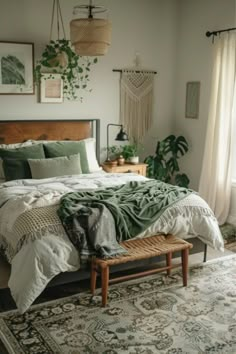 a bedroom with a bed, rug and plants on the wall