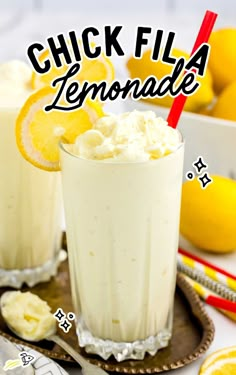 two glasses filled with lemonade and whipped cream