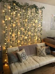 a living room filled with furniture and lots of lights