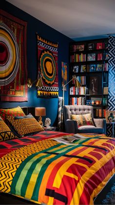 a bed with colorful sheets and pillows in a room filled with bookshelves full of books