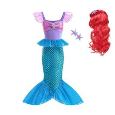 the little mermaid doll has red hair and is next to it's dress up