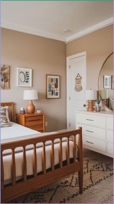 a bed room with a neatly made bed and dresser