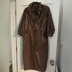 Zara Woman's Faux Leather Brown Shirt Dress Without Belt Size Xl: Never Worn Great Condition. Size Xl : Shoulder Is 17 Inches Under Armpit Is 19" Waist Is 16 " Hip Is 19" Brown Fall Midi Dress With Button Closure, Brown Collared Midi Dress Fitted, Brown Button-up Fall Midi Dress, Brown Button-up Midi Dress For Fall, Brown Fitted Collared Midi Dress, Zara Button-up Shirt Dress For Fall, Zara Shirt Dress With Buttons For Fall, Brown Button Closure Shirt Dress For Fall, Brown Shirt Dress With Button Closure For Fall