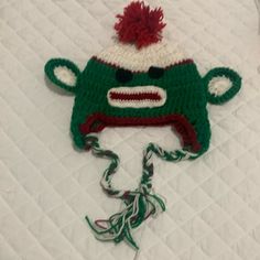 Toddler Sock Money Hat Crochet Hat Christmas Photo Prop Hat Red Green White New No Tags Handmade Never Had Tags Non Smoking Home New Sock Monkey Hat Photo Prop Money Hat, Crochet Baby Elf Hat, Adjustable Green Acrylic Yarn Hat, Crochet Santa Hat Green, Green Hat Baby, Green Acrylic Yarn Hat, One Size, Sock Monkey Hat, Monkey Hat, Christmas Photo Props