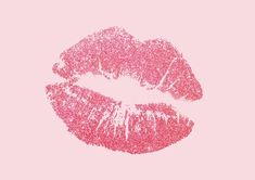 a pink lipstick kiss with glitter on it's lips in the shape of a heart