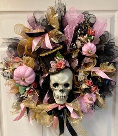 a wreath that has a skull on it