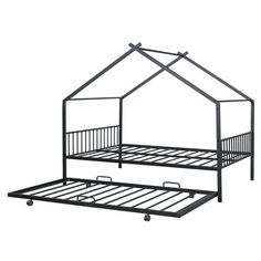 a black metal bed frame with a small house on it's top and bottom