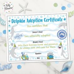 dolphin adoption certificate is displayed on a table