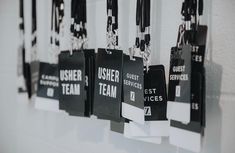 black and white tags hanging on the wall