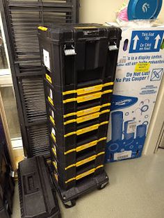 several black and yellow boxes stacked on top of each other