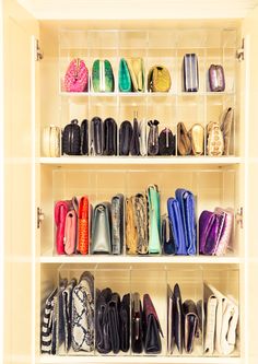 a closet filled with lots of different types of shoes