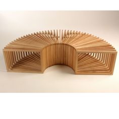 a wooden sculpture made out of strips of wood